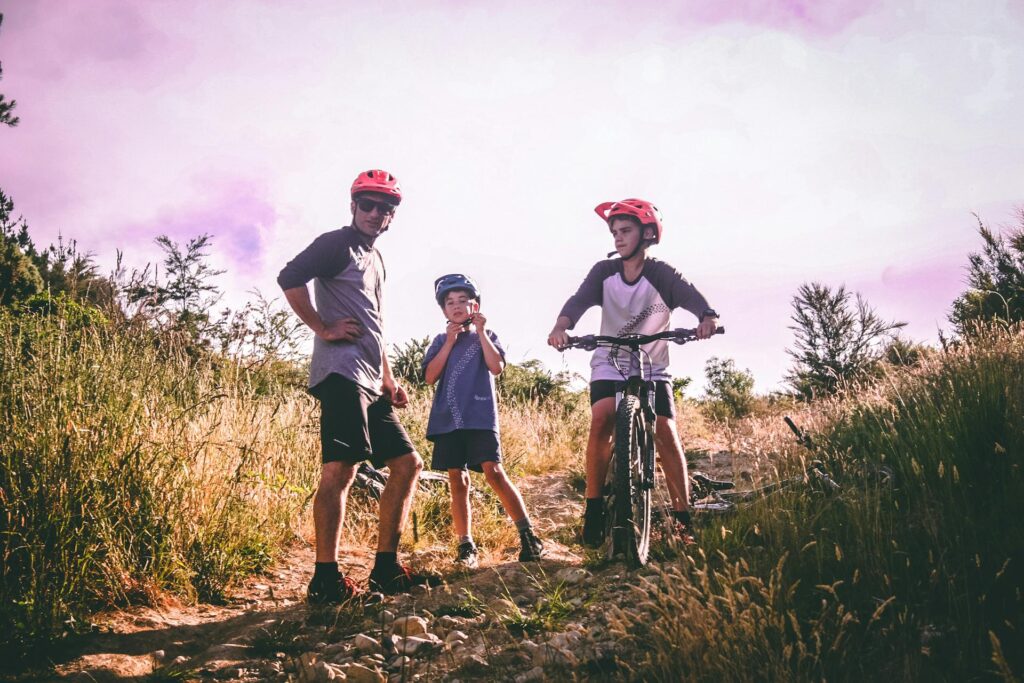 A family biking on a trail