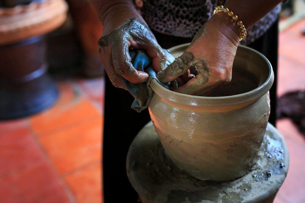 A person making pottery